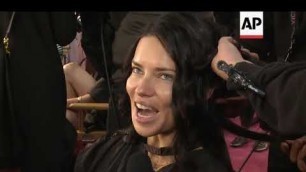 Models get ready backstage at the Victoria's Secret fashion show; Adriana Lima says she plans to go