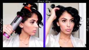 'Using a wireless automated curling iron on my short hair'