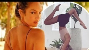 'Candice Swanepoel shows off headstand during yoga session'