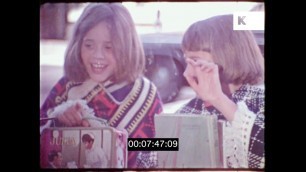 '1970s Fashion, Girls Look in Shop Windows, Ponchos, USA, HD'