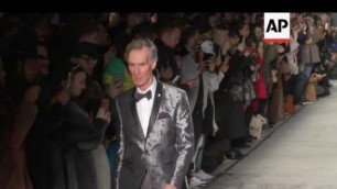 'Buzz Aldrin and Bill Nye walk in fashion show'