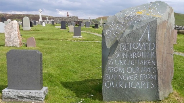 Grave of fashion designer Alexander MCQueen on the island of  Skye