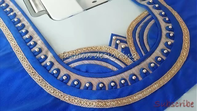 'stitching of a beautiful back neck design of a blouse at home easy | fashion designing'
