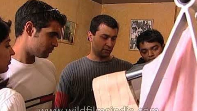Ashish Soni attending to his customers at his design studio: Archive Footage