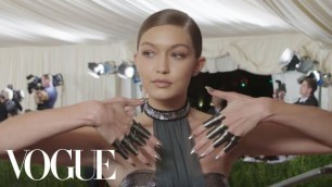 'Gigi Hadid on Her Futuristic Bathing Suit and Chrome Knuckles | Met Gala 2016'